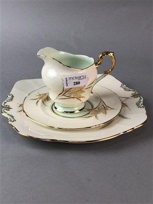 Lot 280 - A PARAGON FLORAL AND GILT PART TEA SERVICE