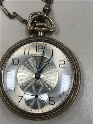 Lot 809 - A GOLD PLATED POCKET WATCH ON A GOLD CHAIN