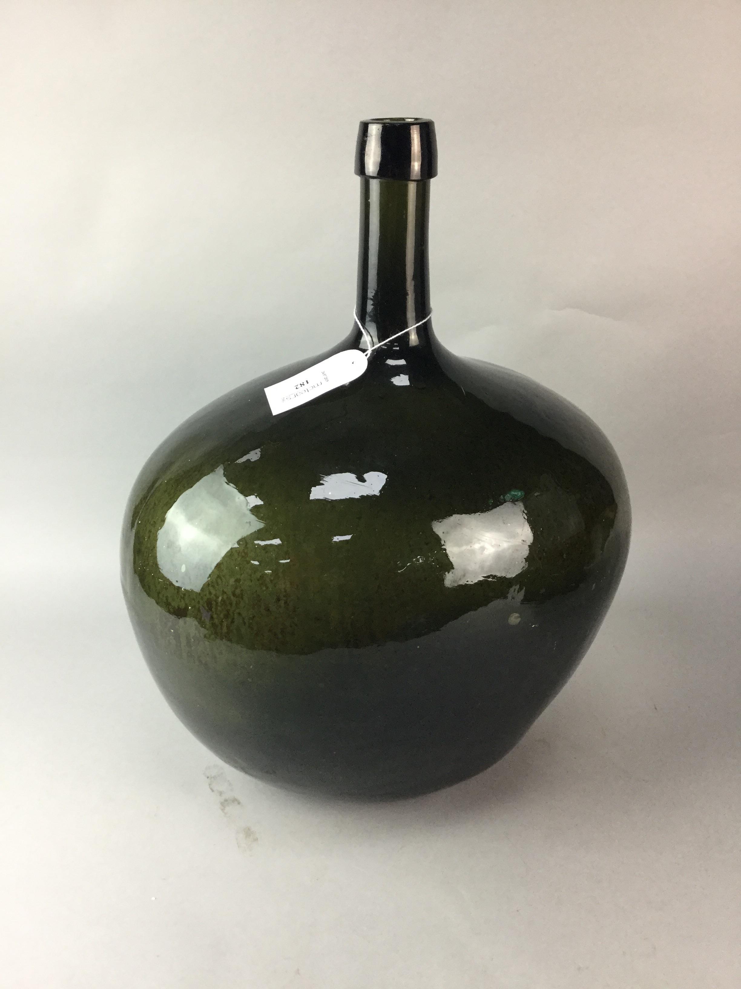 Lot 182 A LARGE GREEN GLASS VASE