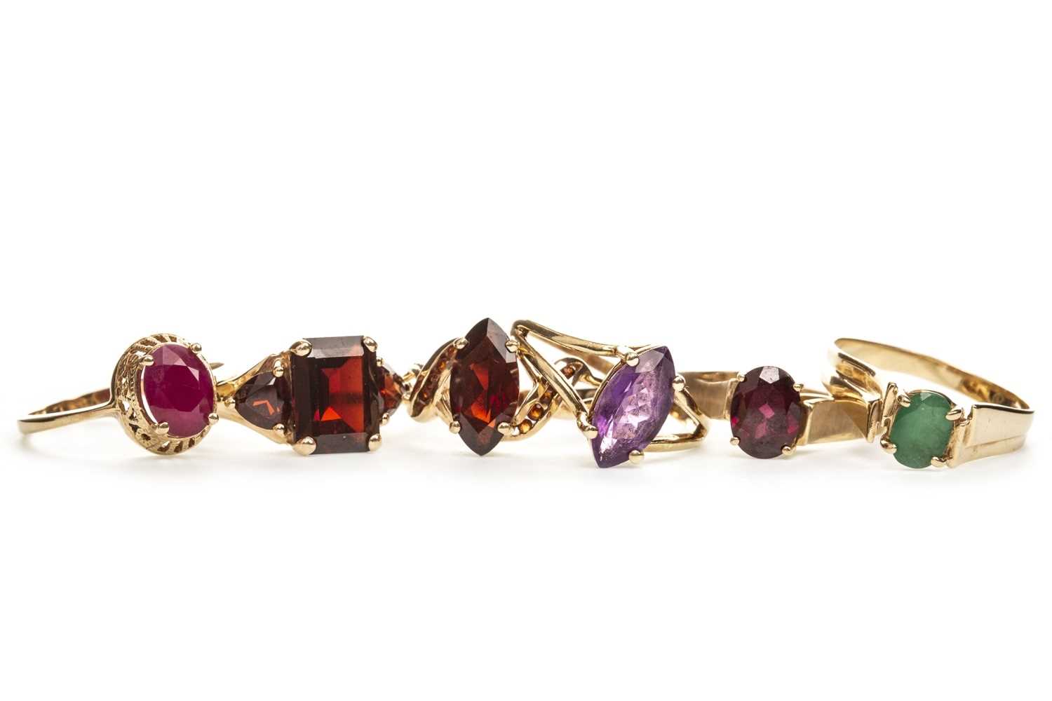 Lot 217 - FIVE GOLD GEM SET RINGS