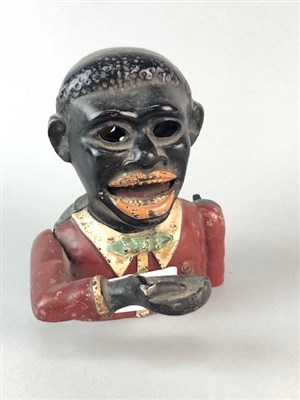 Lot 328 - A JOLLY MAN MONEY BANK