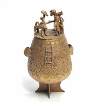 Lot 680 - EARLY 20TH CENTURY ASHANTI BRASS GOLD DUST POT...