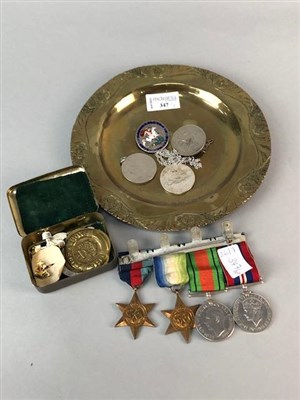 Lot 347 - A WORLD WAR II MEDAL GROUP, COINS, BRASS TRAY AND A BELT