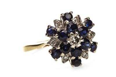 Lot 172 - A BLUE GEM AND DIAMOND CLUSTER RING