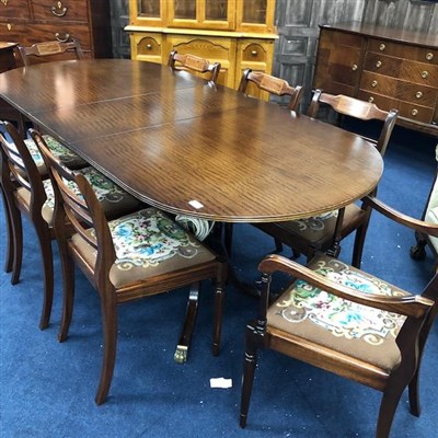 Lot 460 - A MAHOGANY DINING SUITE