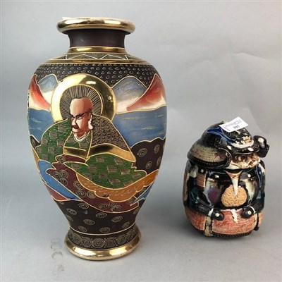 Lot 397 - A JAPANESE POTTERY JAR AND COVER