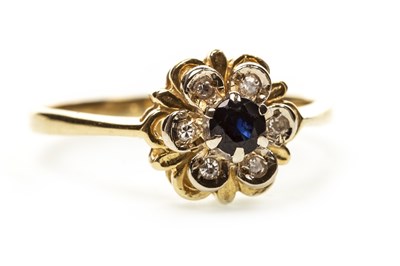 Lot 51 - A BLUE GEM AND DIAMOND CLUSTER RING