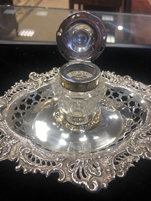 Lot 844 - A VICTORIAN SILVER AND GLASS INKWELL