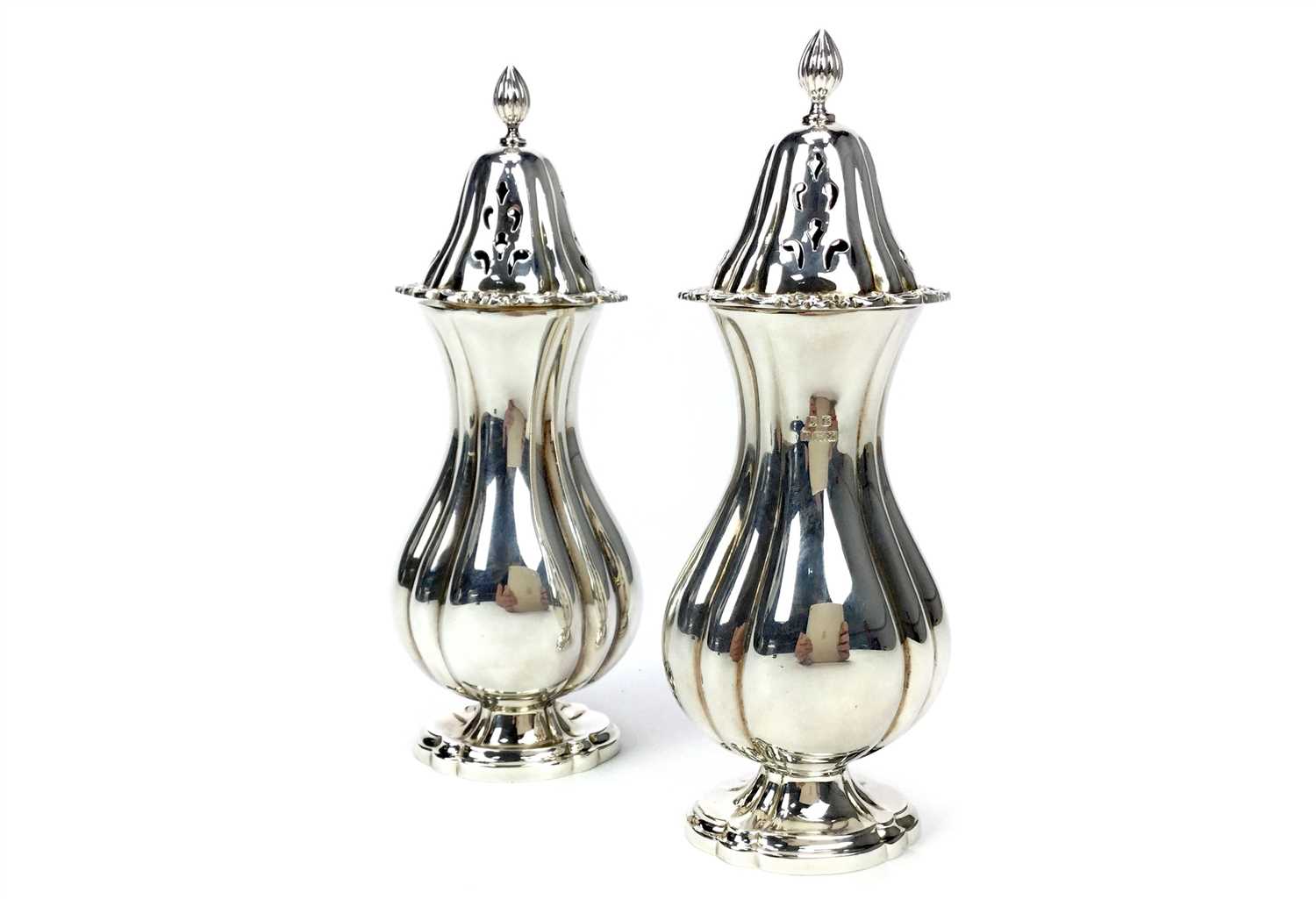 Lot 847 - A PAIR OF SUGAR CASTERS