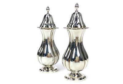 Lot 847 - A PAIR OF SUGAR CASTERS