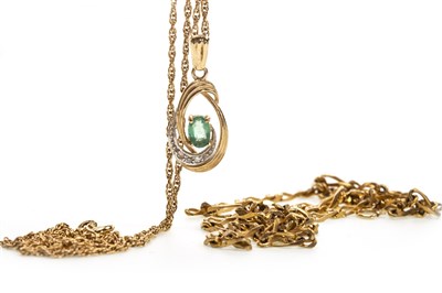 Lot 40 - A GREEN GEM SET PENDANT AND TWO CHAINS