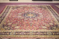 Lot 721 - SABZWAR BORDERED CARPET decorated with a large...