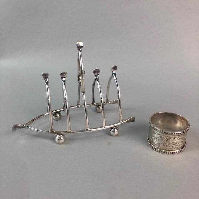 Lot 123 - A SILVER CIRCULAR NAPKIN RING AND A  PLATED WISHBONE TOAST RACK