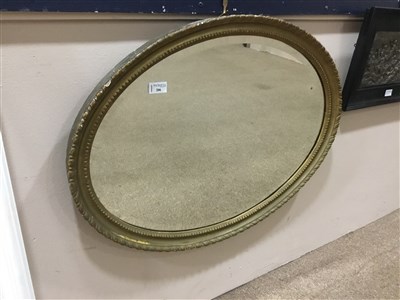 Lot 155 - A BEVELLED MIRROR AND MUSIC CABINET