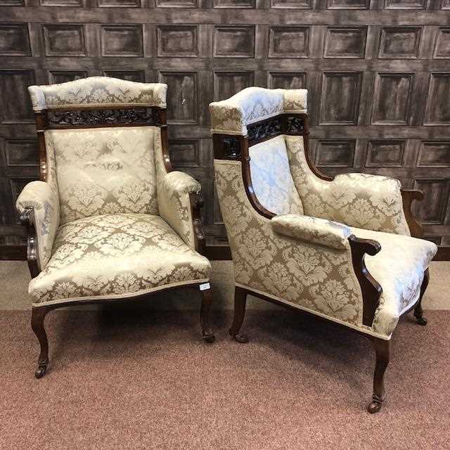 Lot 850 - A PAIR OF EDWARDIAN WALNUT FRAMED WING BACK ARMCHAIRS