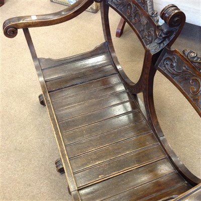 Lot 847 - A LATE VICTORIAN CARVED OAK DOUBLE CHAIR BACK HALL SEAT