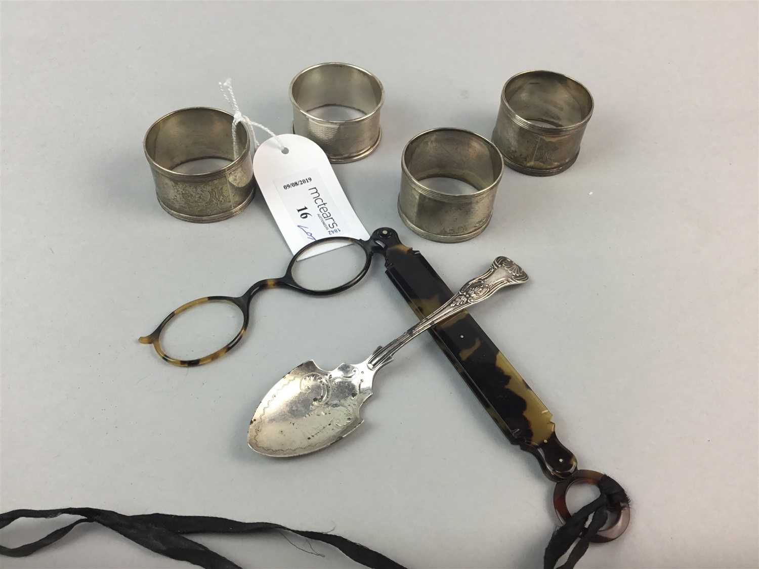 Lot 16 - A LOT OF SILVER NAPKIN RINGS, A SILVER SPOON AND A LORGNETTE