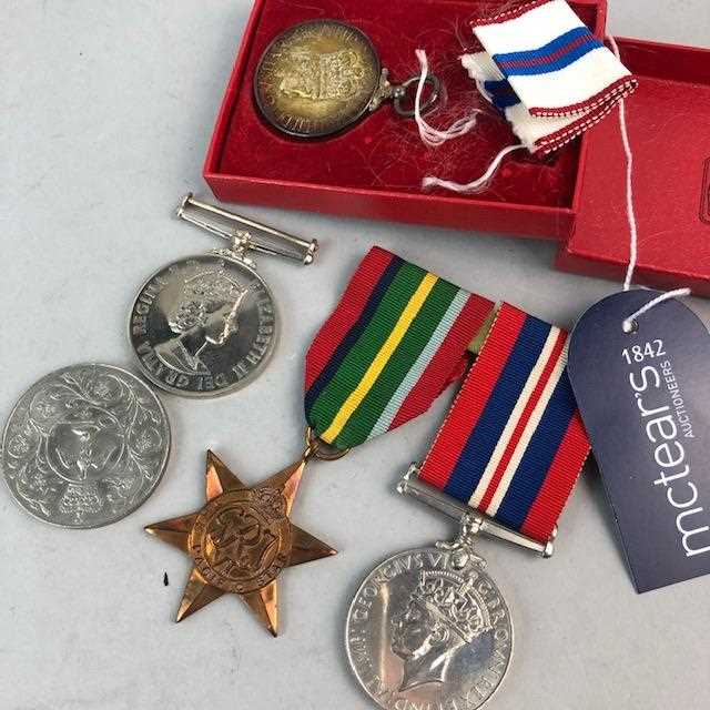 Lot 25 - AN EXEMPLARY POLICE SERVICE MEDAL AND OTHER MEDALS