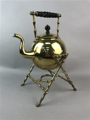 Lot 240 - A BRASS TEA KETTLE ON STAND