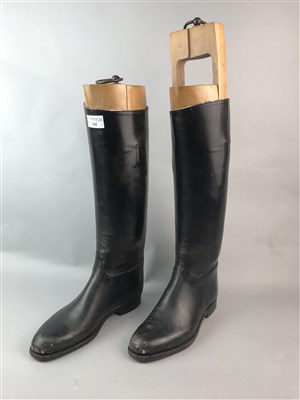 Lot 242 - A PAIR OF BLACK LEATHER BOOTS AND COBBLERS LASTS