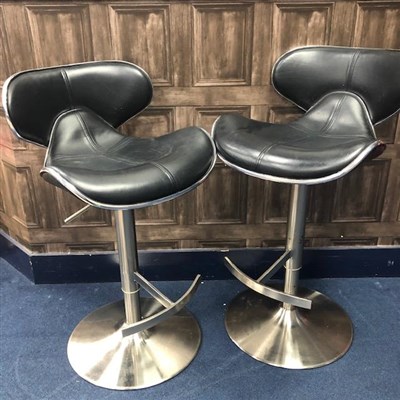 Lot 142 - A PAIR OF STAINLESS STEEL BAR STOOLS