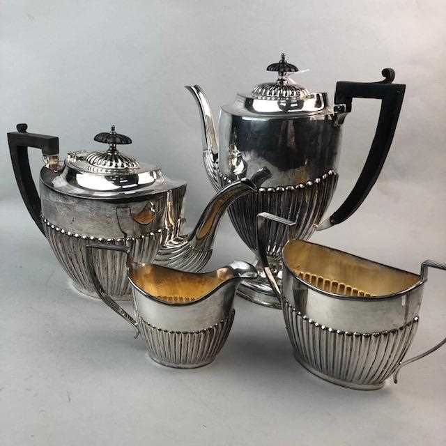 Lot 172 - A SILVER PLATED TEA SERVICE