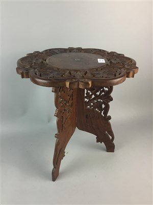 Lot 398 - A PAIR OF EASTERN CARVED WOOD CIRCULAR OCCASIONAL TABLES