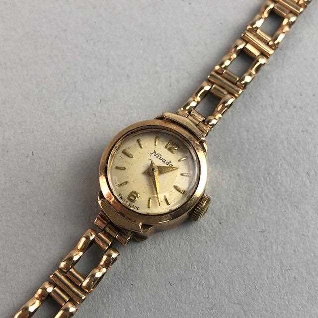 Lot 2 - A LADIES GOLD NIVADA WRIST WATCH AND OTHER JEWELLERY