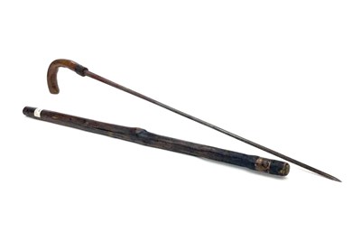 Lot 897 - A 19TH CENTURY HOLLY WALKING/SWORD STICK