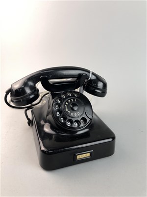 Lot 134 - A VINTAGE BLACK BAKELITE TELEPHONE AND ANOTHER