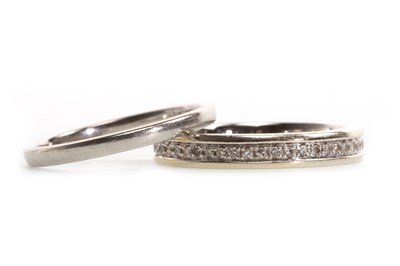 Lot 30 - A DIAMOND HALF ETERNITY RING AND A WEDDING BAND