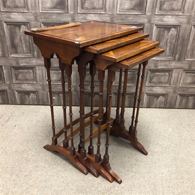 Lot 333 - A YEW WOOD NEST OF FOUR TABLES