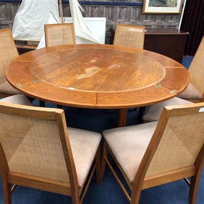 Lot 342 - A DANISH CIRCULAR EXTENDING DINING TABLE AND EIGHT CHAIRS