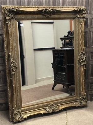 Lot 355 - A LARGE DECORATIVE WALL MIRROR