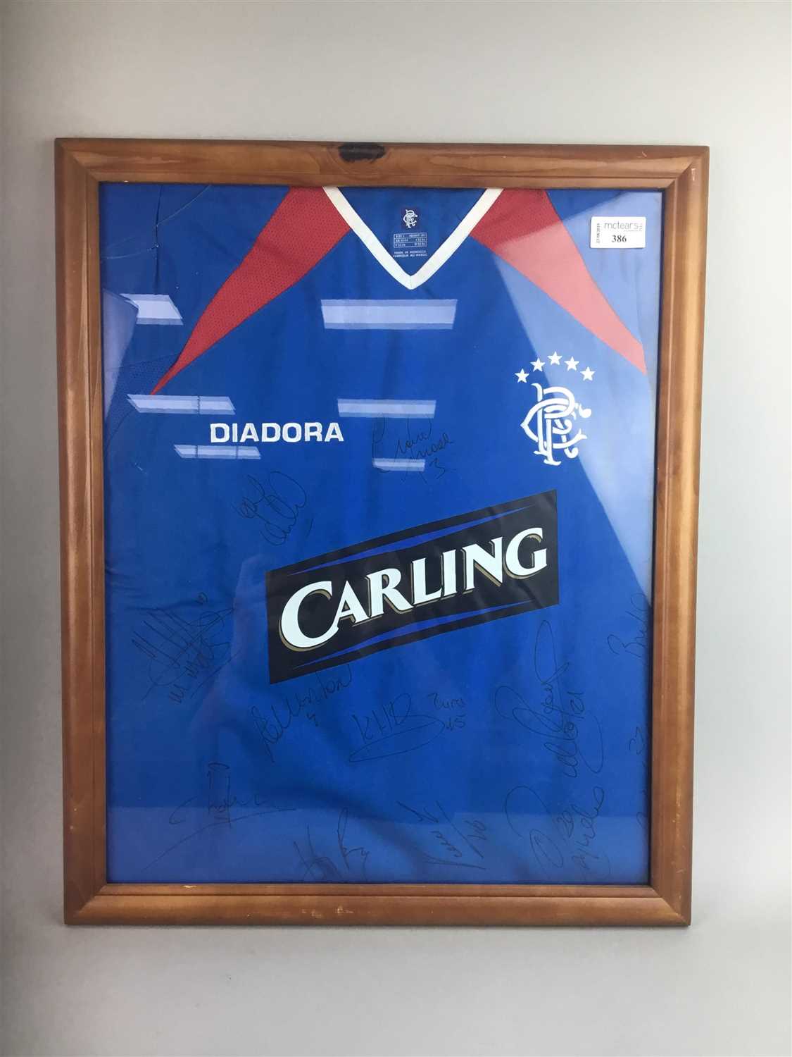 Lot 386 - A FRAMED SIGNED RANGERS FOOTBALL TOP