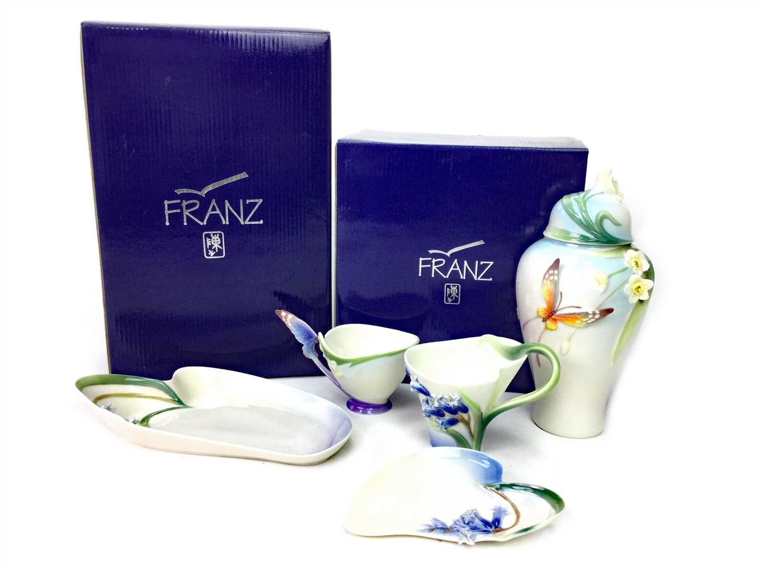 Lot 1249 - A LOT OF TWO FRANZ CUP AND SAUCERS, TRAY AND GINGER JAR