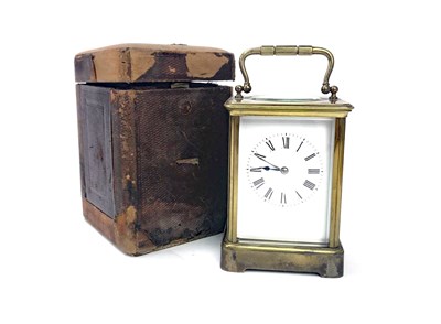 Lot 1432 - AN EARLY 20TH CENTURY BRASS CARRIAGE CLOCK