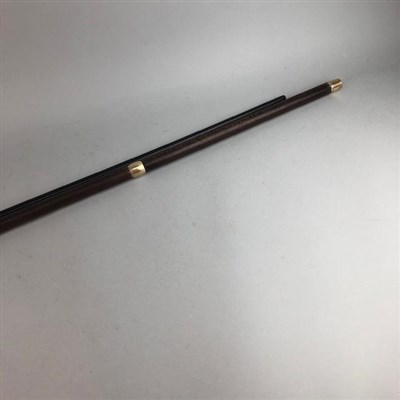 Lot 258 - A LOT OF TWO STAINED WOOD WALKING STICKS