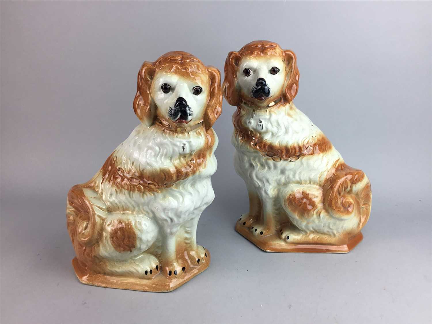 Lot 259 - A PAIR OF BO'NESS POTTERY DOGS