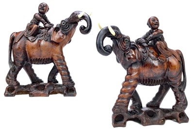 Lot 1068 - A PAIR OF CHINESE ELEPHANT GROUPS