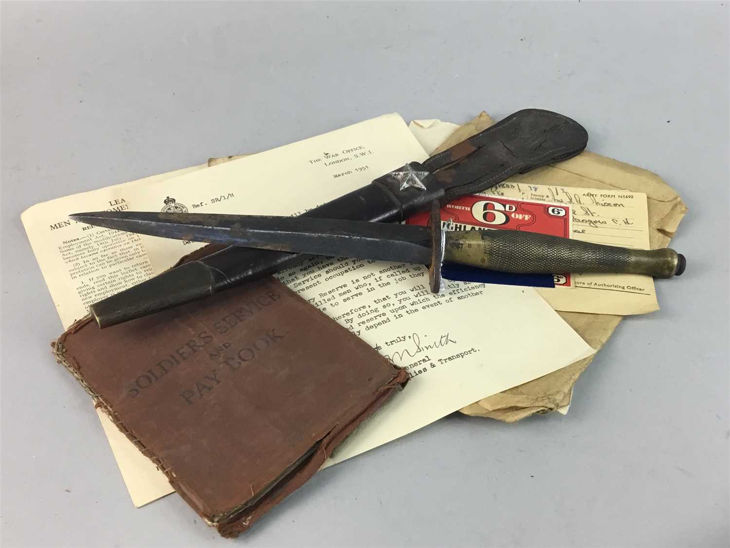 Lot 51 - A WWII DAGGER ALONG WITH SOLDIER'S PAPERS