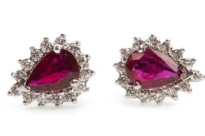 Lot 58 - A PAIR OF RUBY AND DIAMOND CLUSTER EARRINGS