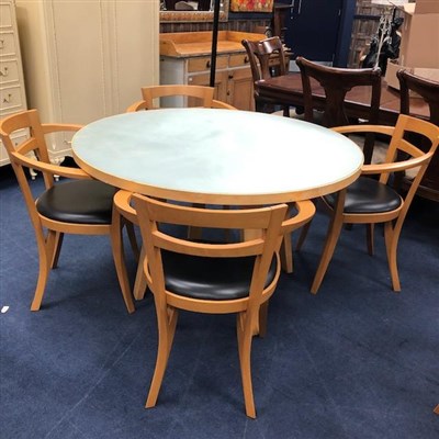 Lot 268 - A GLASS TOPPED DINING TABLE AND FOUR CHAIRS