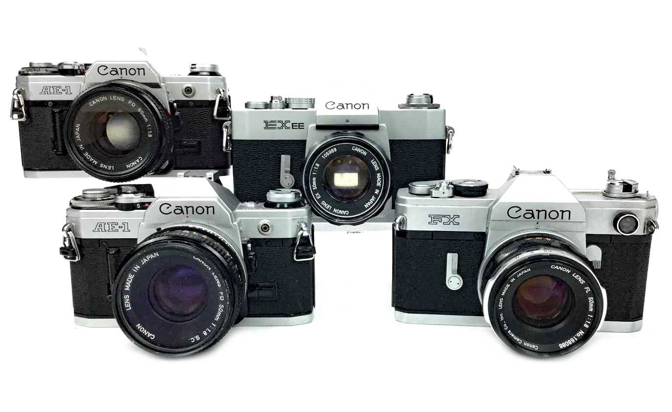 Lot 1489 - A LOT OF TWO CANON AE-1 SLR CAMERAS AND TWO OTHER CANONS