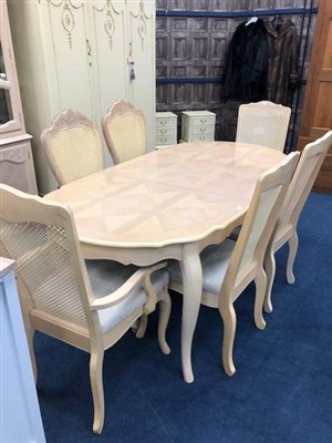 Lot 304 - A MODERN DINING SUITE
