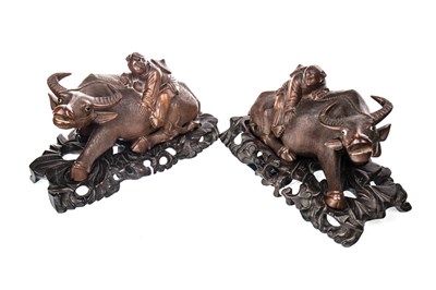 Lot 1083 - A PAIR OF CARVED WOOD BUFFALO