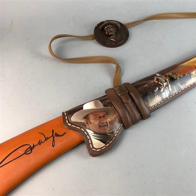 Lot 404 - A JOHN WAYNE WALL HANGING RIFLE