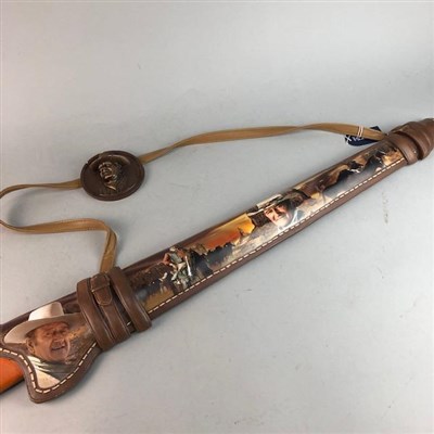 Lot 404 - A JOHN WAYNE WALL HANGING RIFLE