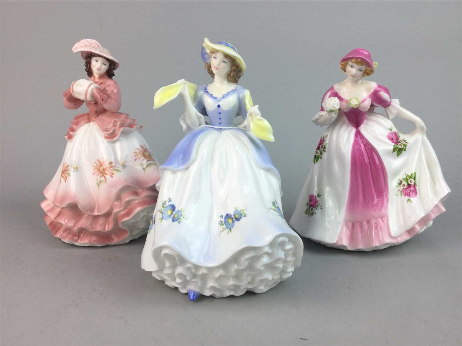 Lot 153 - A COLLECTION OF FIVE ROYAL WORCESTER FIGURES OF LADIES