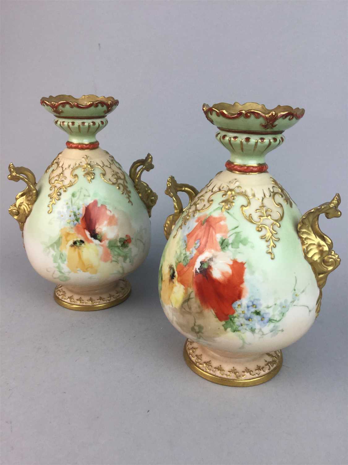 Lot 162 - A PAIR OF POSSIL POTTERY NAUTILUS VASES